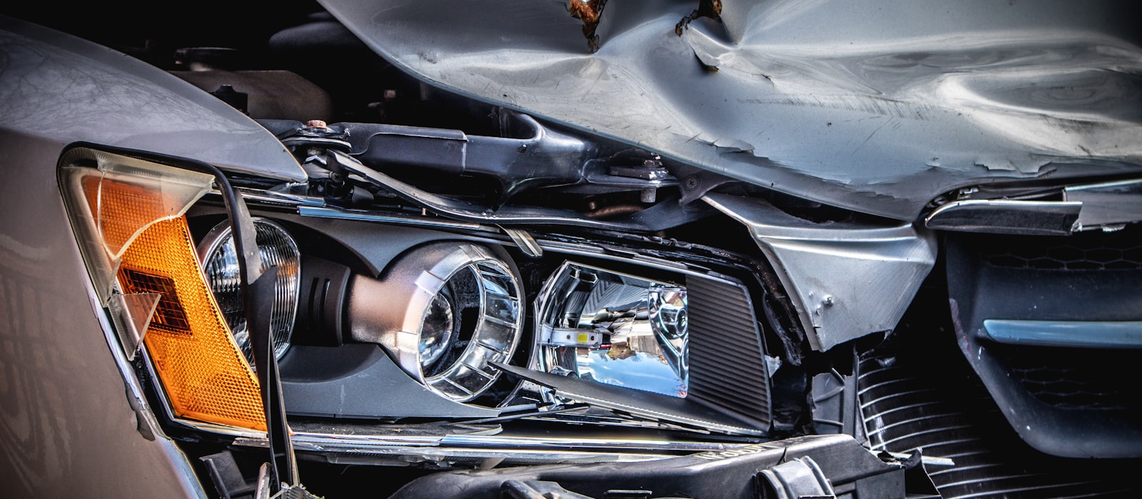 Front-end damage to a car after an Orlando crash
