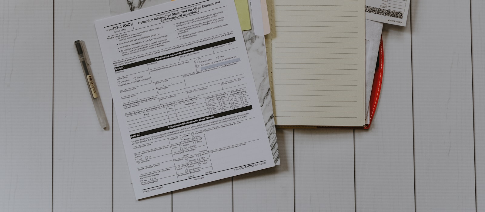Accident claim paperwork on a clipboard in Gainesville