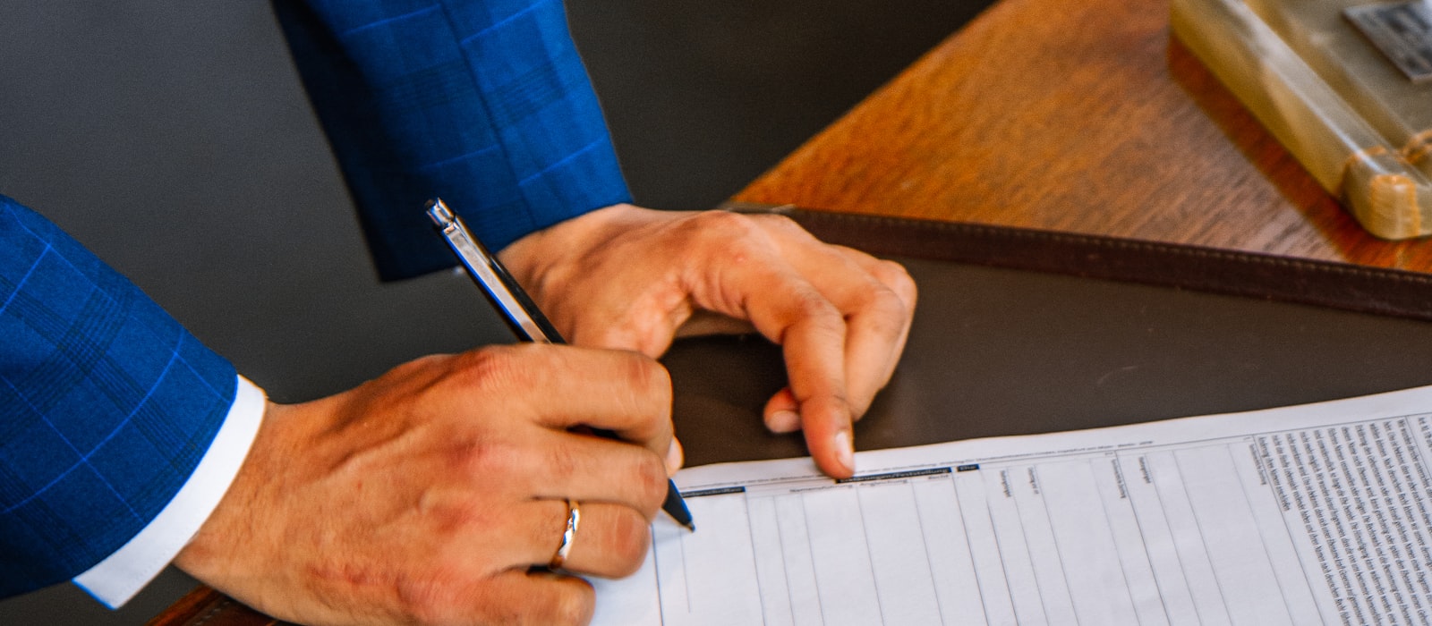 Signing a settlement agreement in Bradenton
